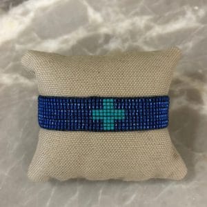 Bracelet tissé strass bleus et croix turquoise